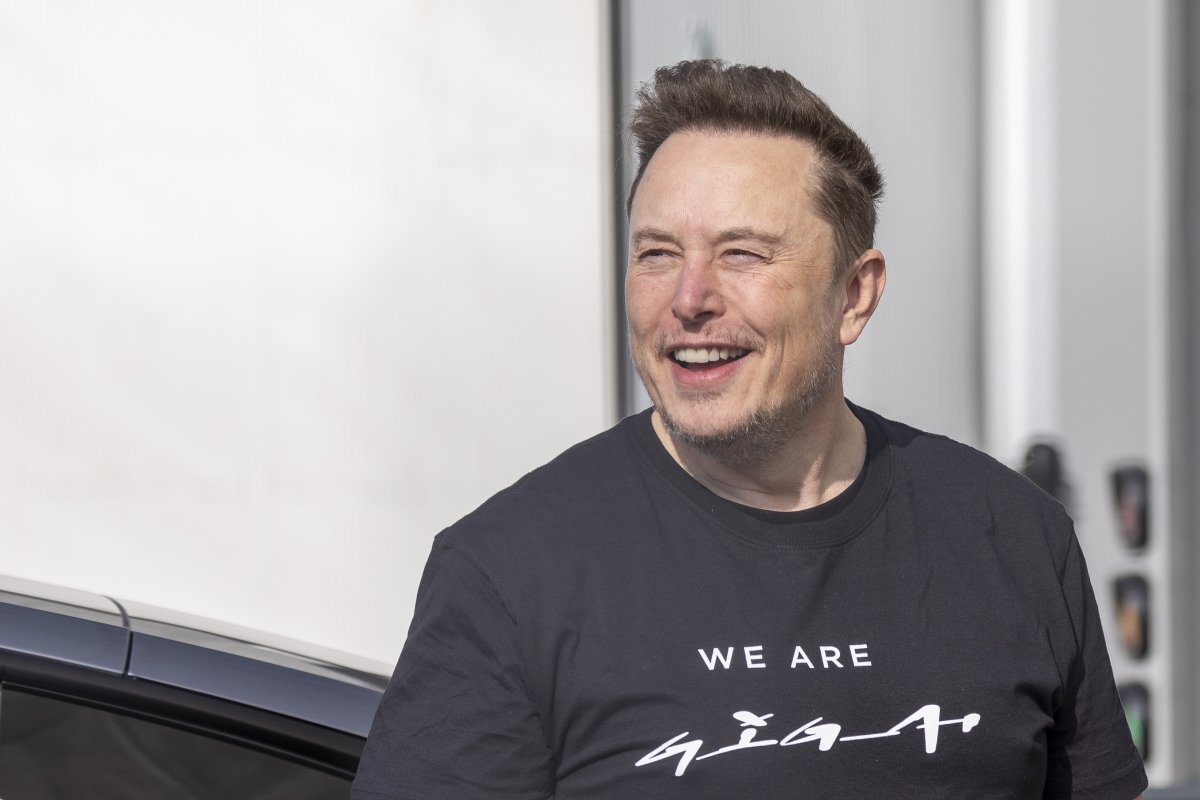 Elon Musk leaving a Tesla factory