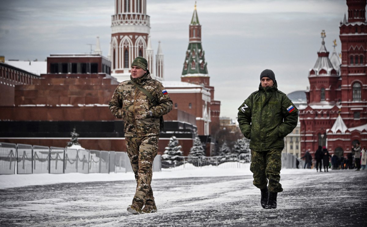 Russian servicemen walk through Red Square Moscow