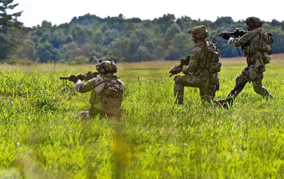 Green Berets Move Through Field 