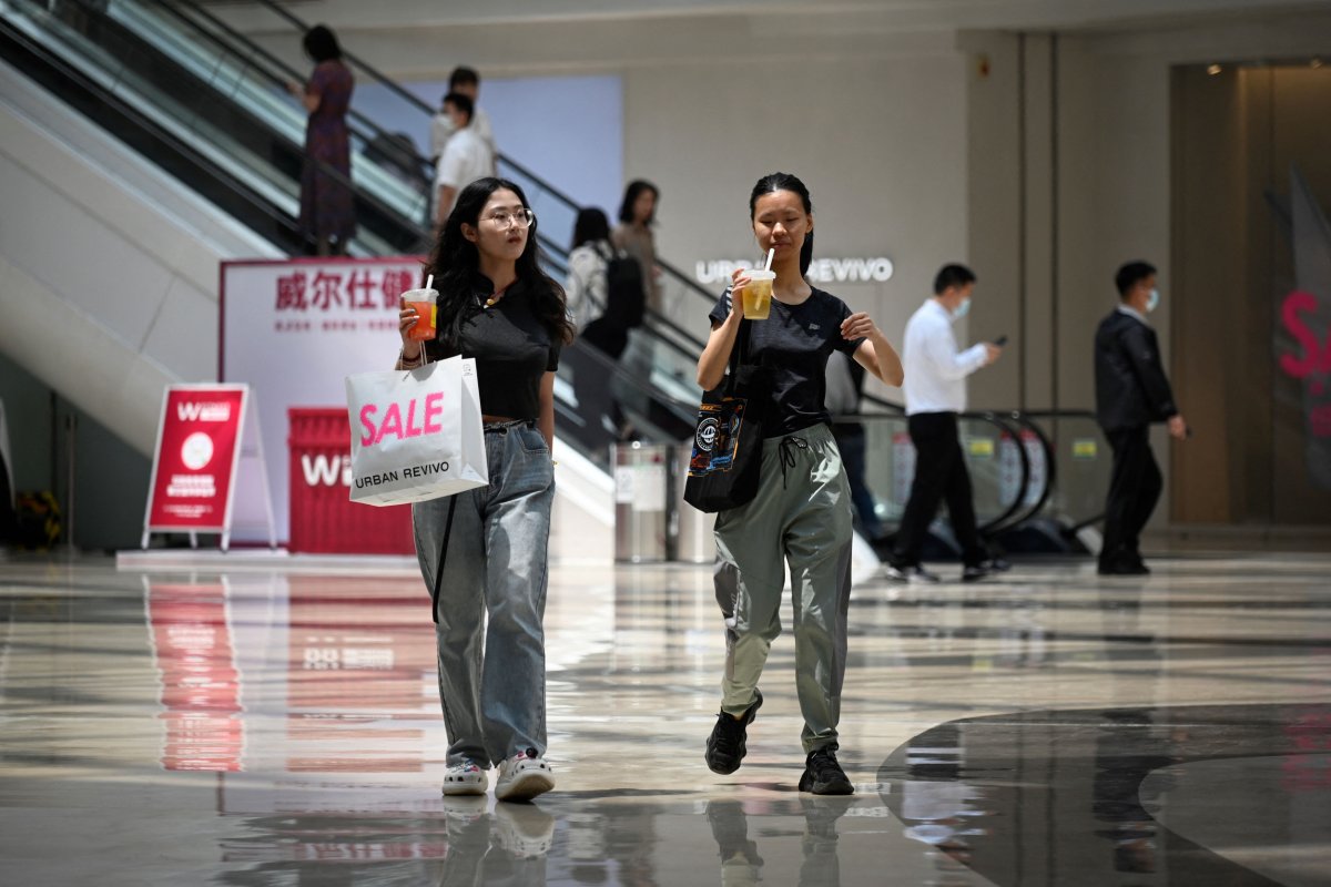 Shoppers Stroll Through Beijing Mall