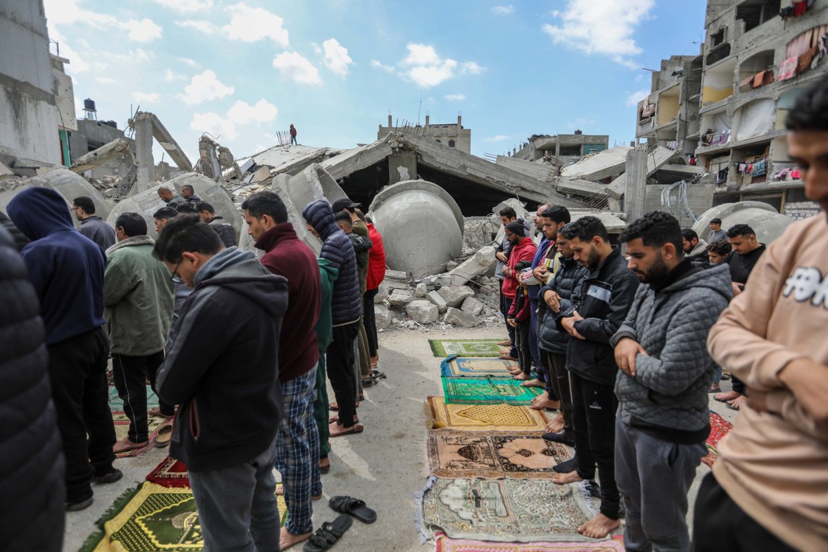 Palestinians, pray, at, destroyed, mosque, Rafah, Gaza