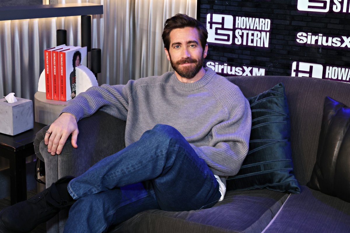 Jake Gyllenhaal sitting on couch