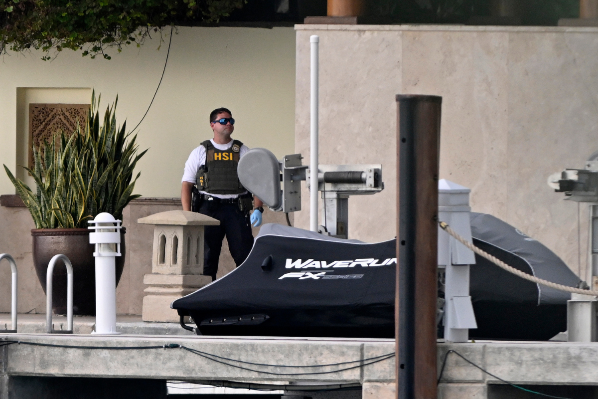 Homeland Security officer outside Combs' Miami home