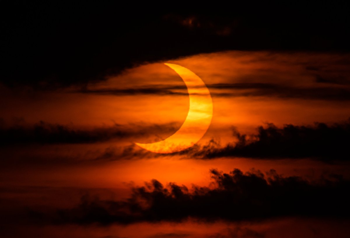 Solar eclipse clouds