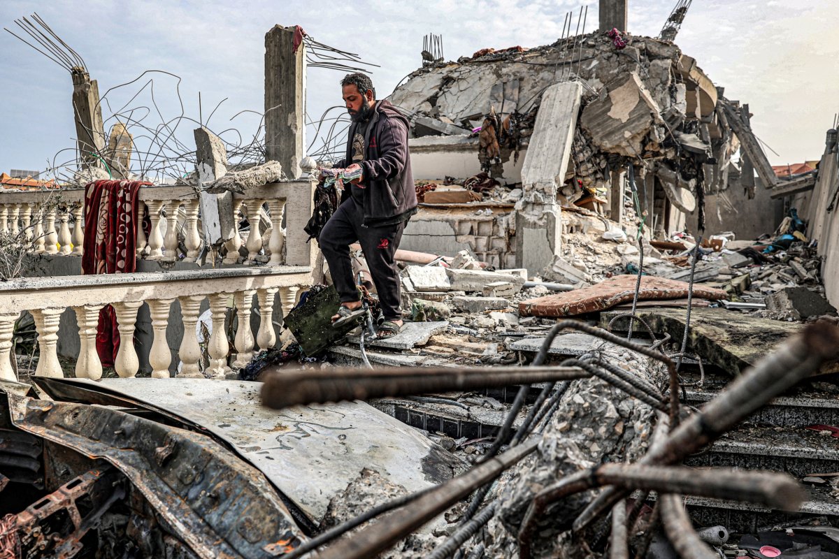 Man amongst rubble in Rafah March 2024