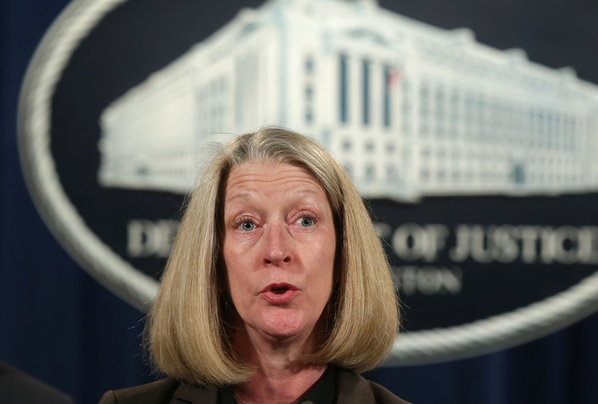 Mary McCord speaks at the Justice Department