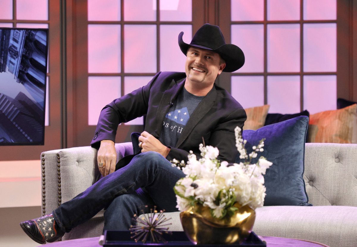 john rich sitting on couch