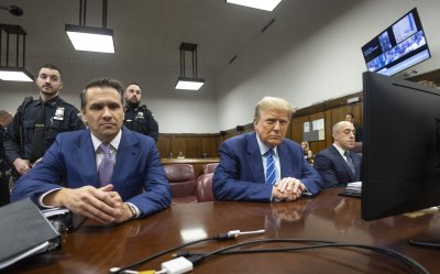 Trump in court alongside attorneys