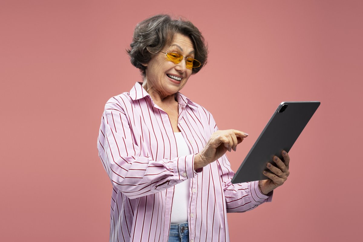 A woman looks at her iPad