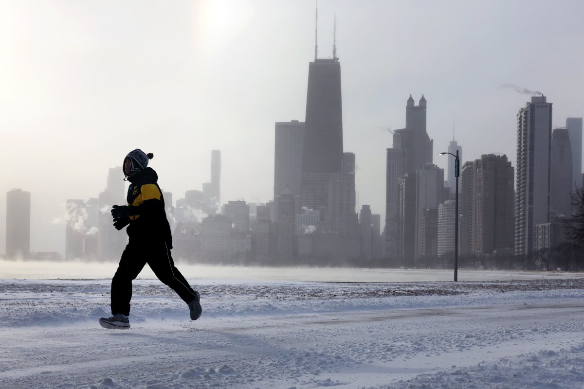 A jogger runs along Lake Michigan 