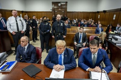 Trump seated with his attorneys in court