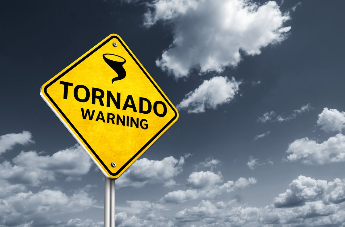 Stock image of tornado warning sign 