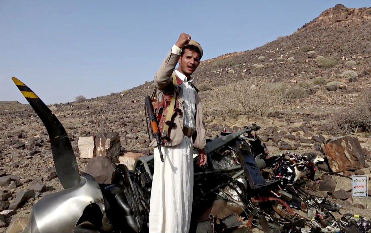 Houthi, fighter, poses, by, US, drone, Yemen