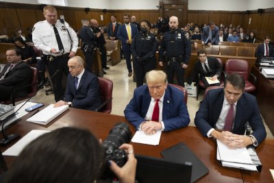 Trump and attorneys at defense table