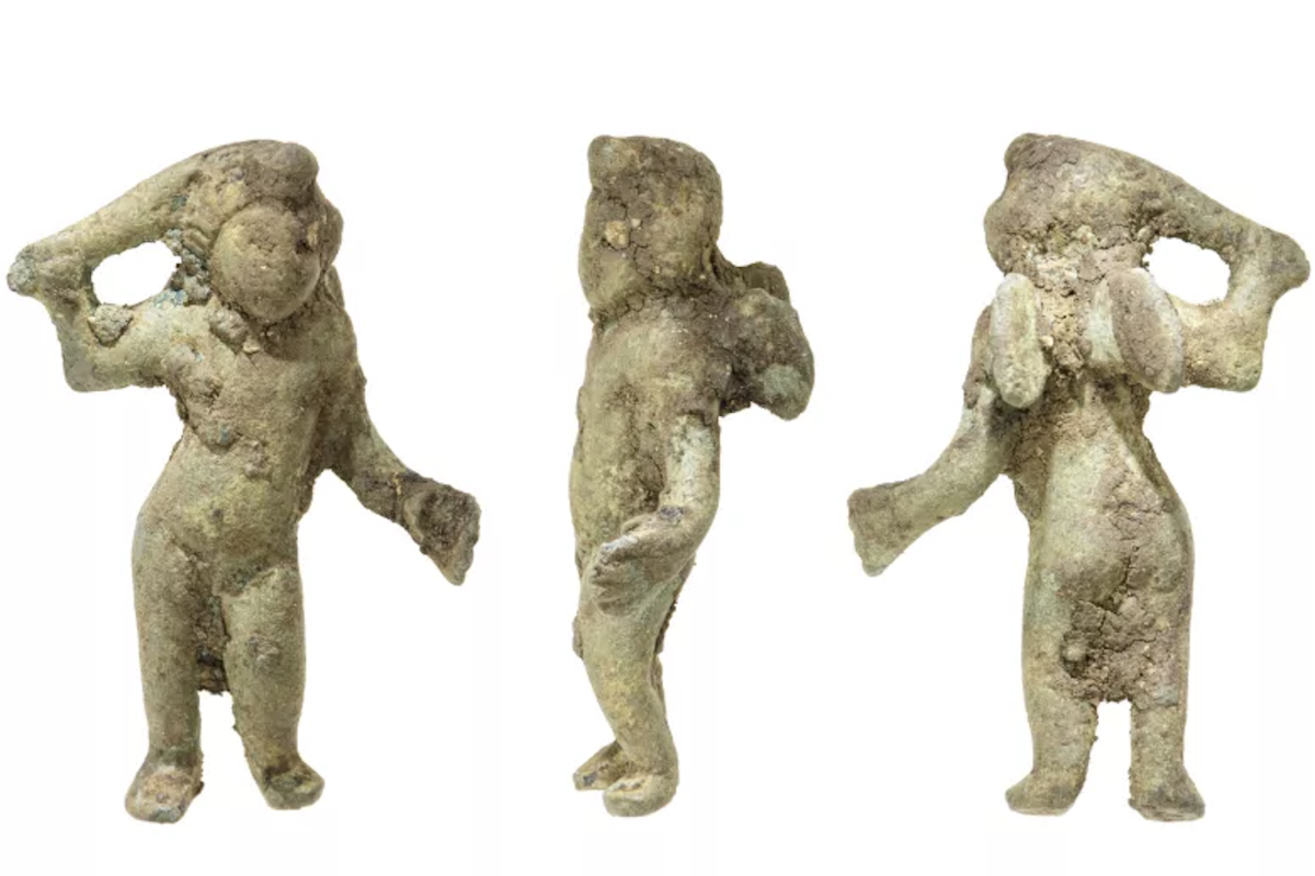 An ancient Roman Cupid figurine
