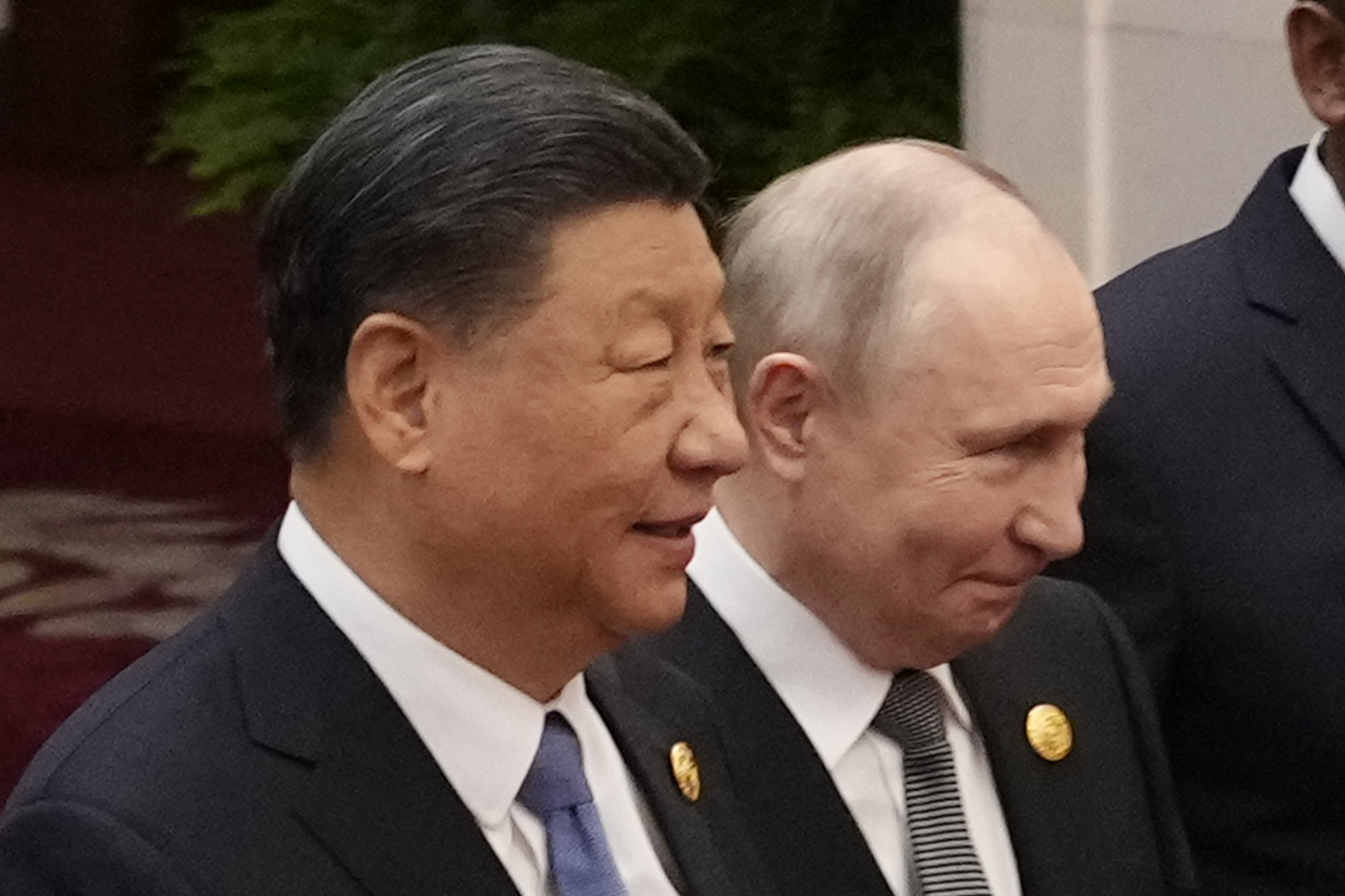 Xi Offers Putin Political Relief With China State Visit