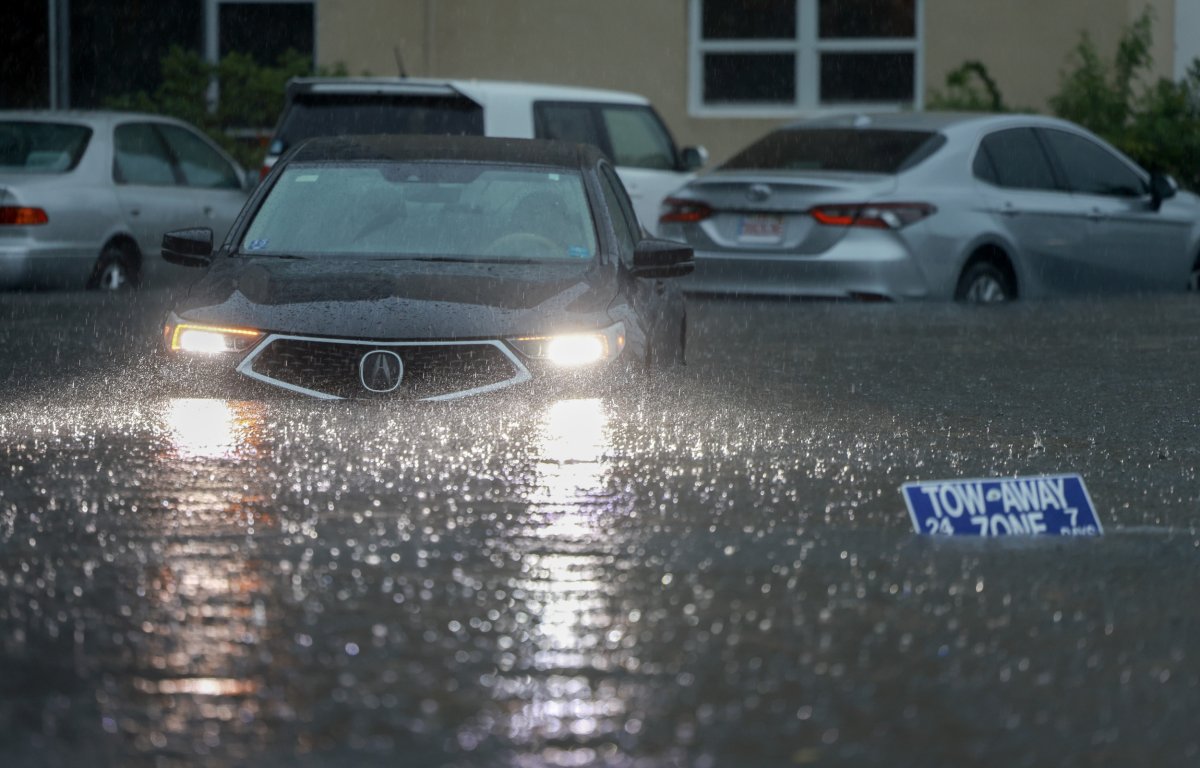 A vehicle sits in flood waters
