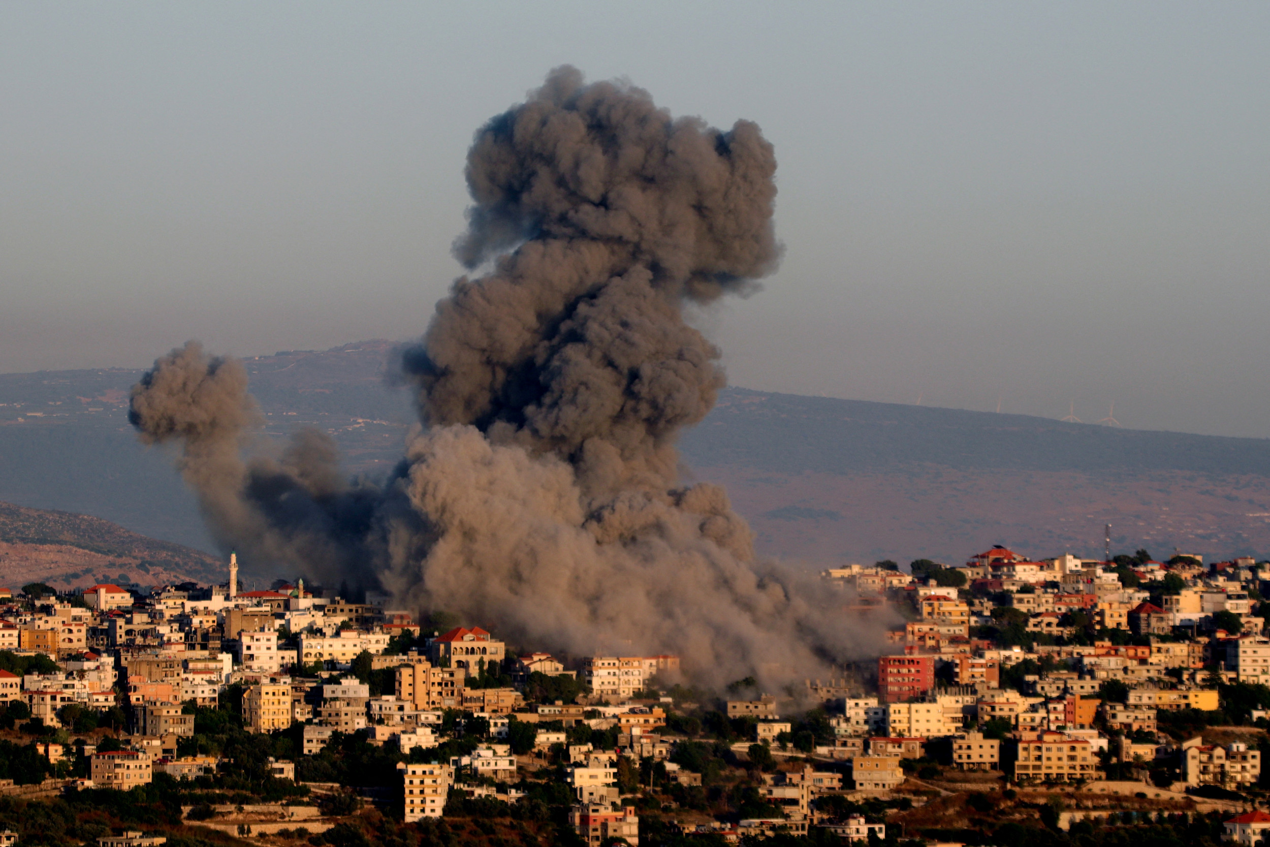 Iran and Israel exchange stark new warnings over Lebanon border battle