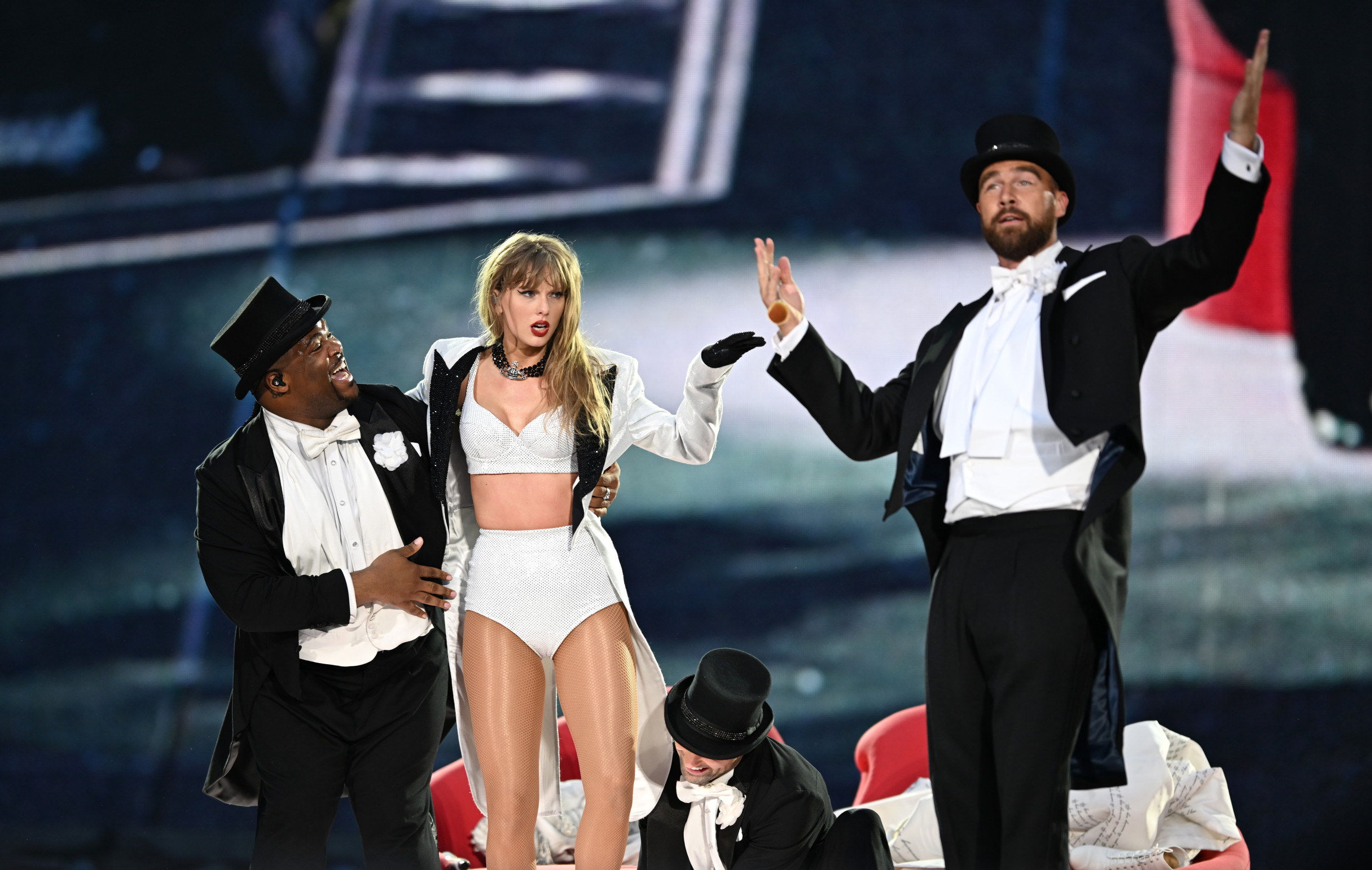 Travis Kelce surprises Taylor Swift fans with stage appearance alongside the singer