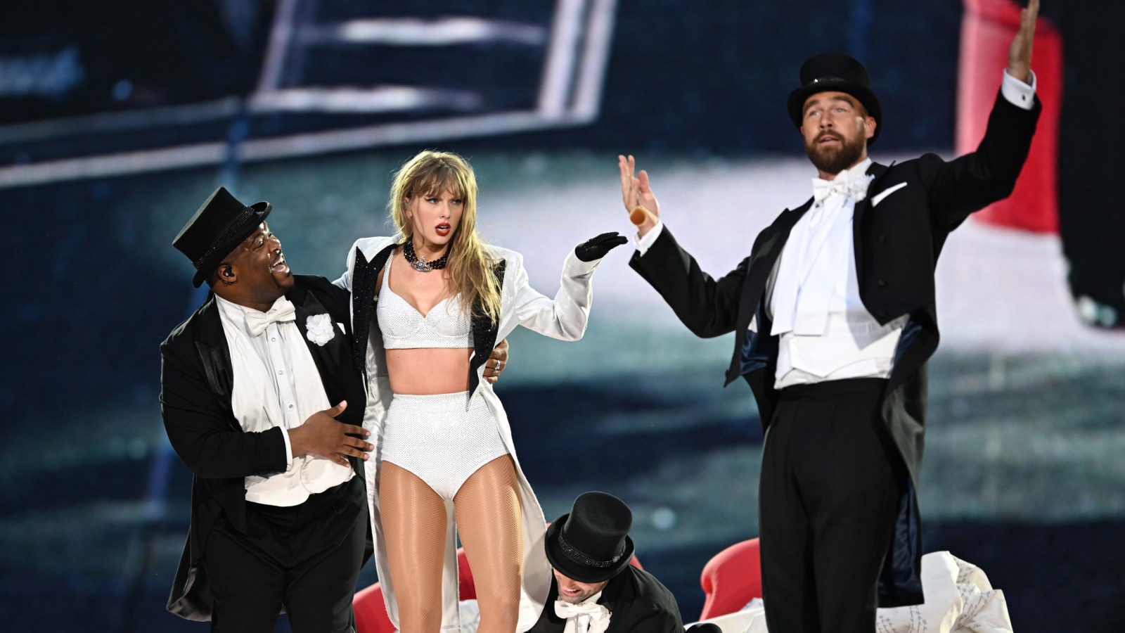 Travis Kelce Close-Up Details Spark Frenzy As He Joins Taylor Swift Onstage - Newsweek