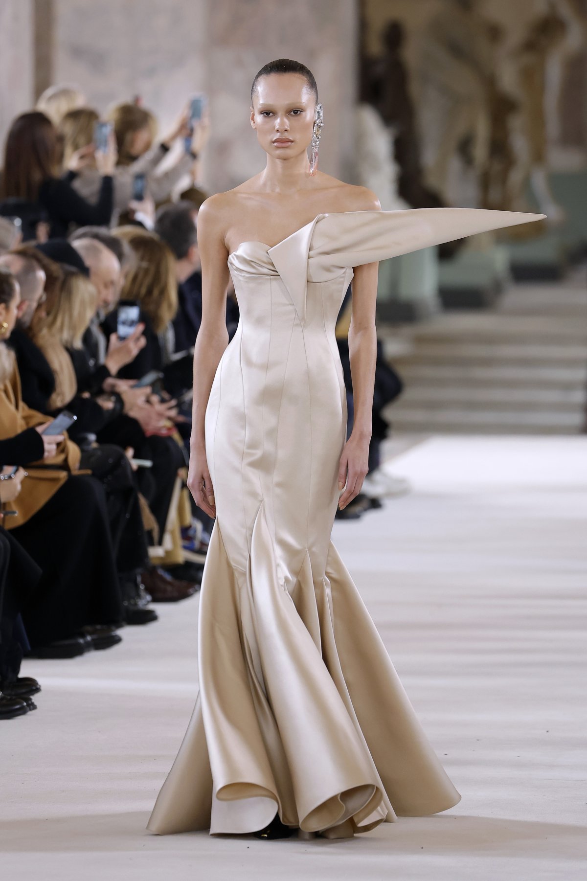 A model walks at Schiaparelli