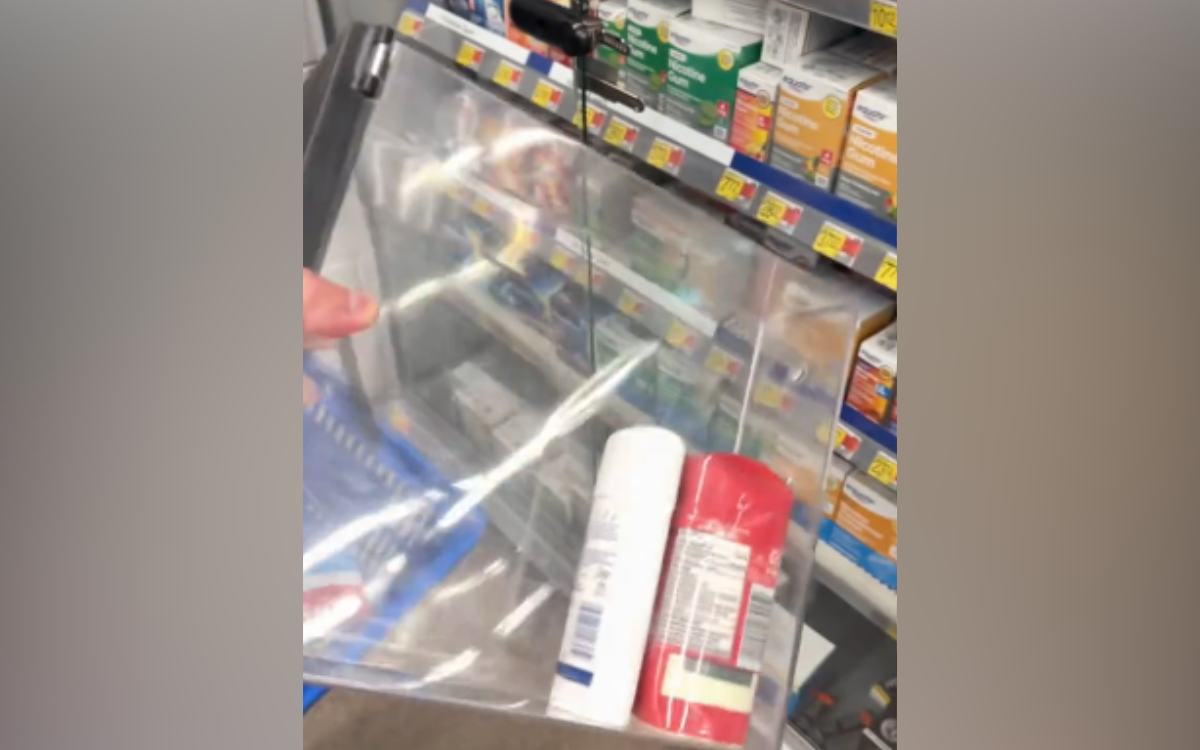 A woman documenting her Walmart experience.