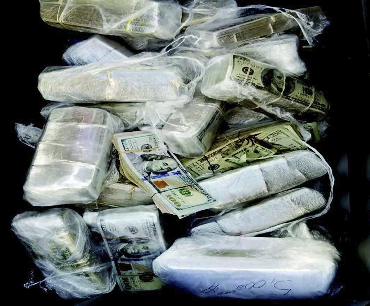 Photo provided by the U.S.District Attorney shows confiscated drug money.