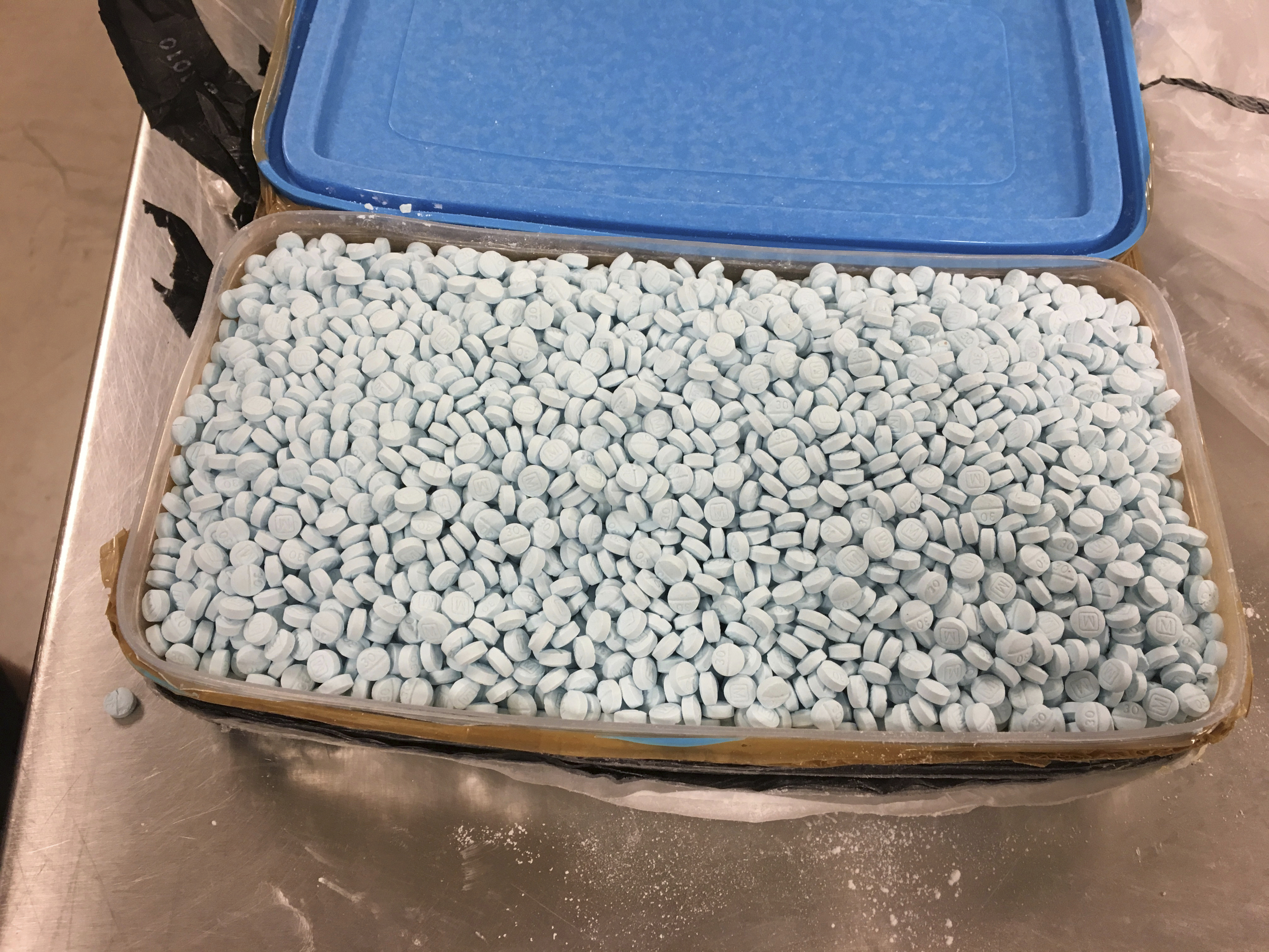 Two Men Arrested, Police Say 10,000 Fentanyl Pills Seized