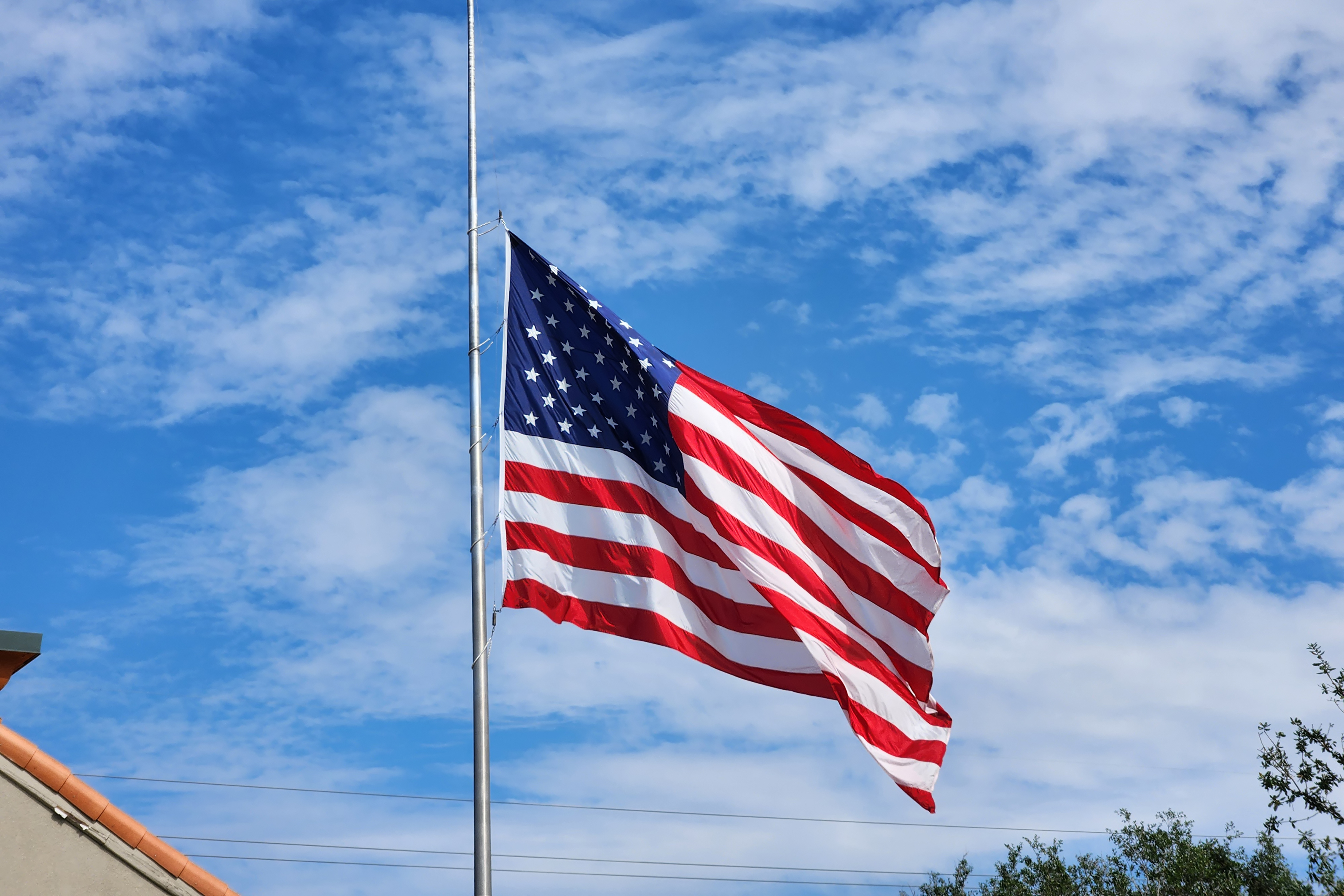 Why today, this weekend, flags are flying at half-mast in three states