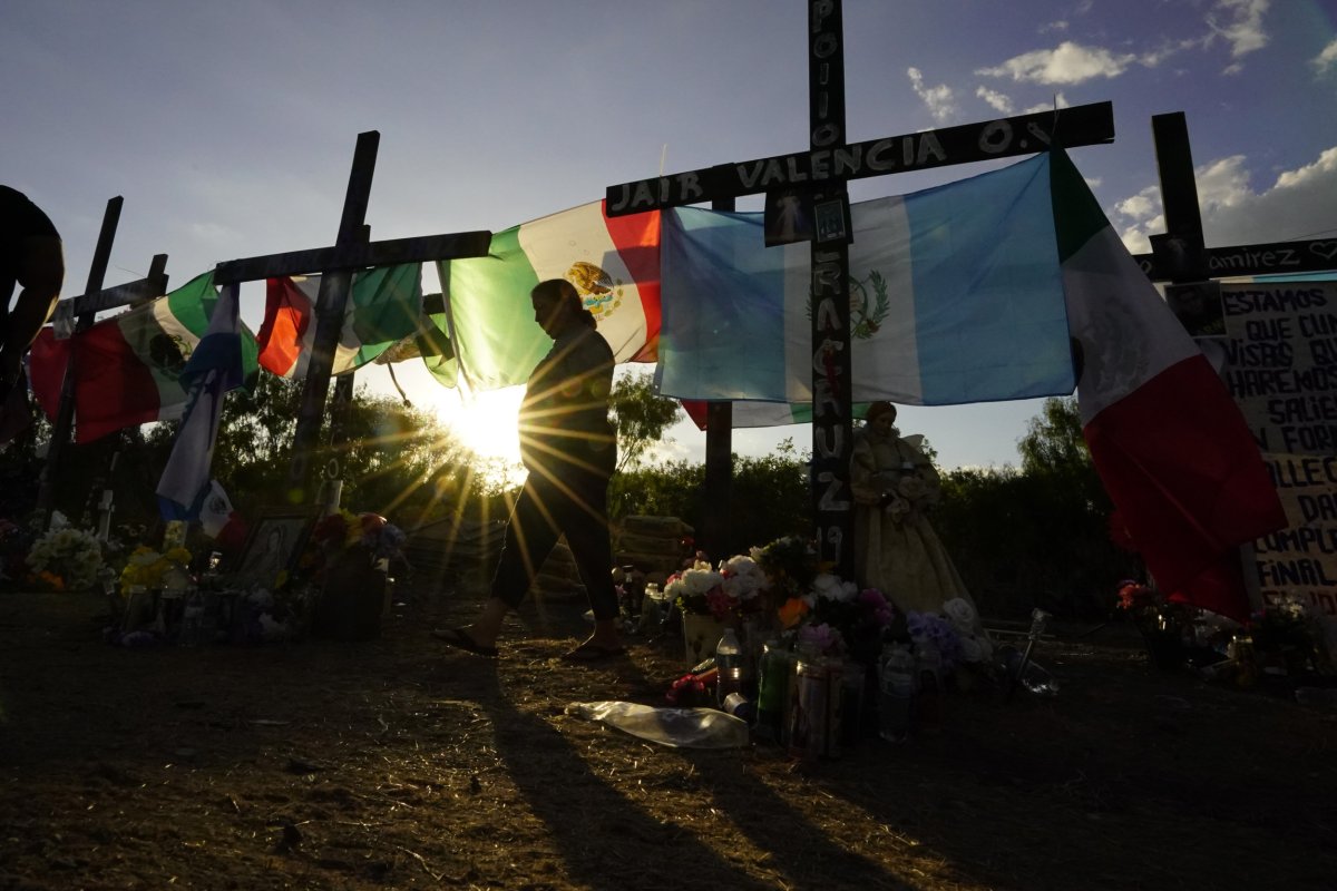 Mourners at a make-shift memorial
