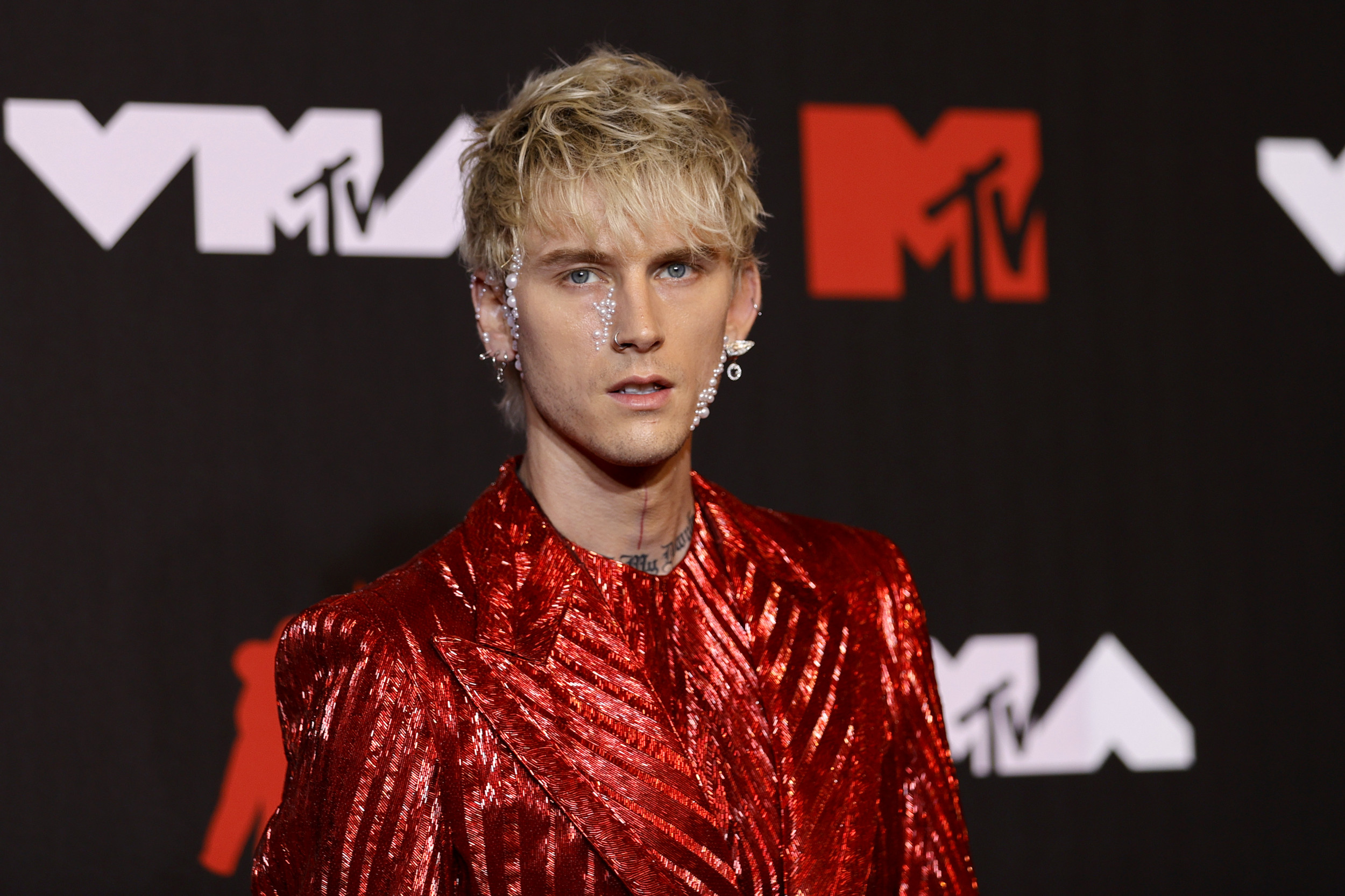 MGK reveals that his father was put on trial for the murder of his own father at the age of 9