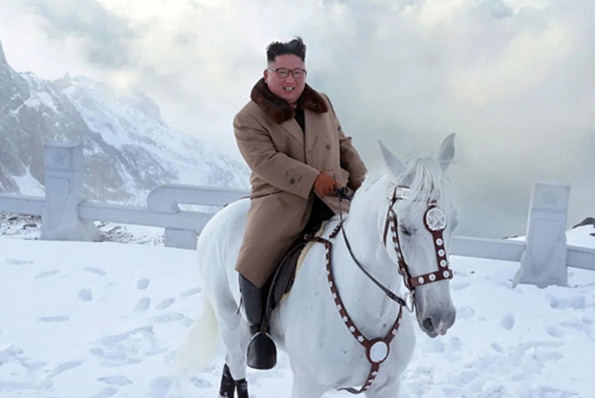 Kim Sits On Horse On Mount Paektu