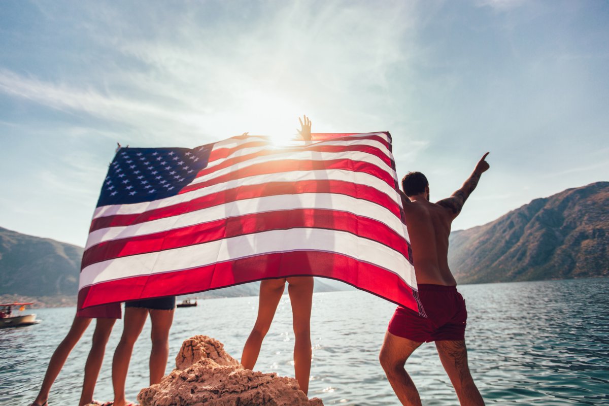 American flag by lake