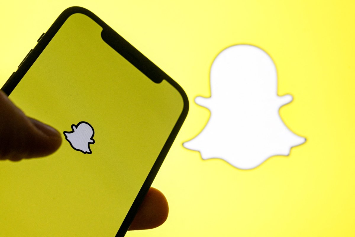 The SnapChat logo on a smartphone screen.