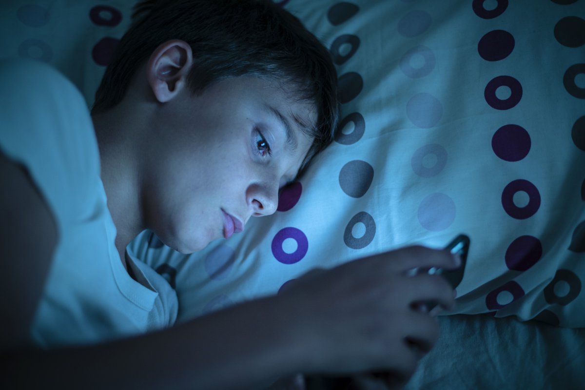 Boy addicted to smartphone insomnia problems