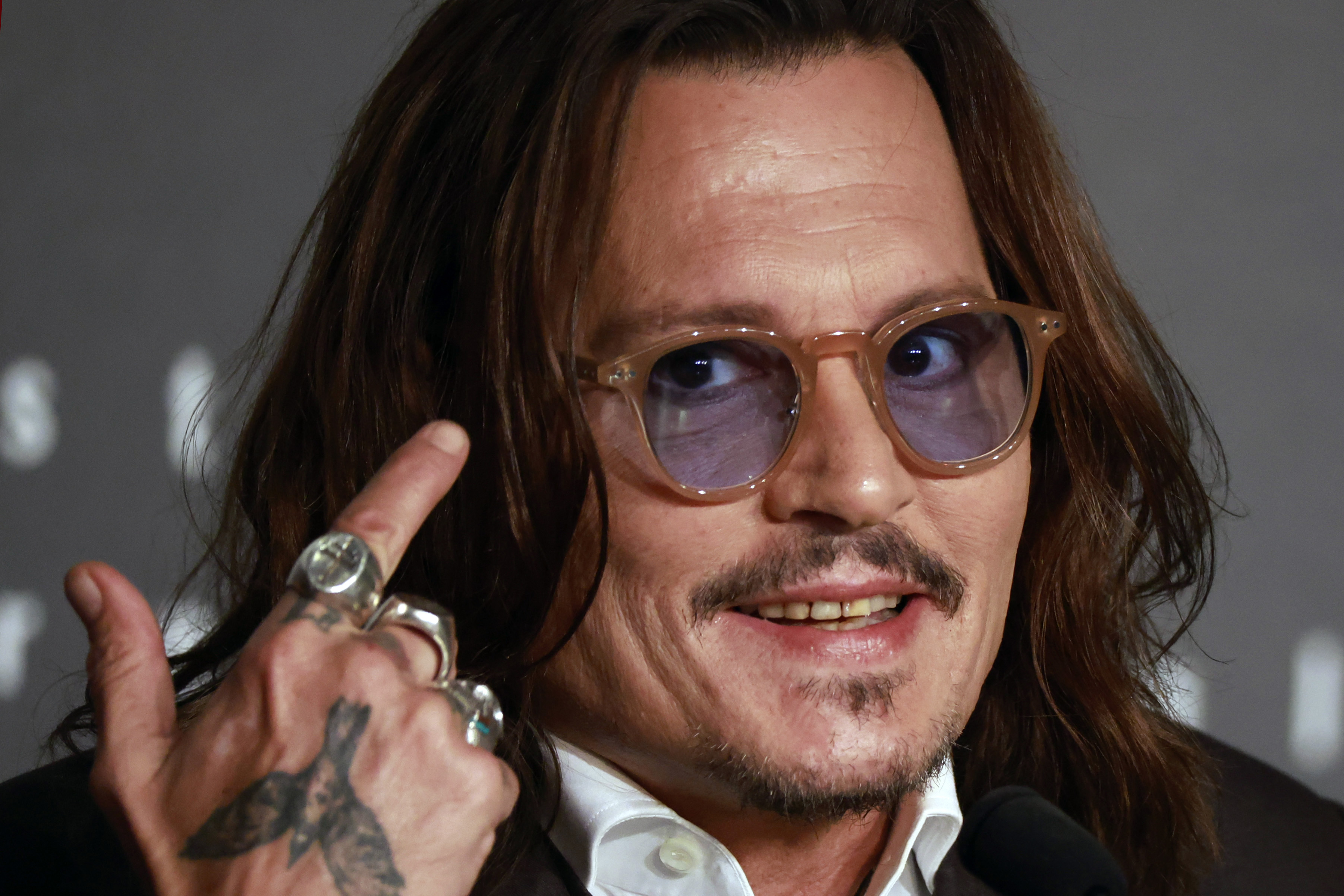 Johnny Depp Unveils New Smile in Bahamas