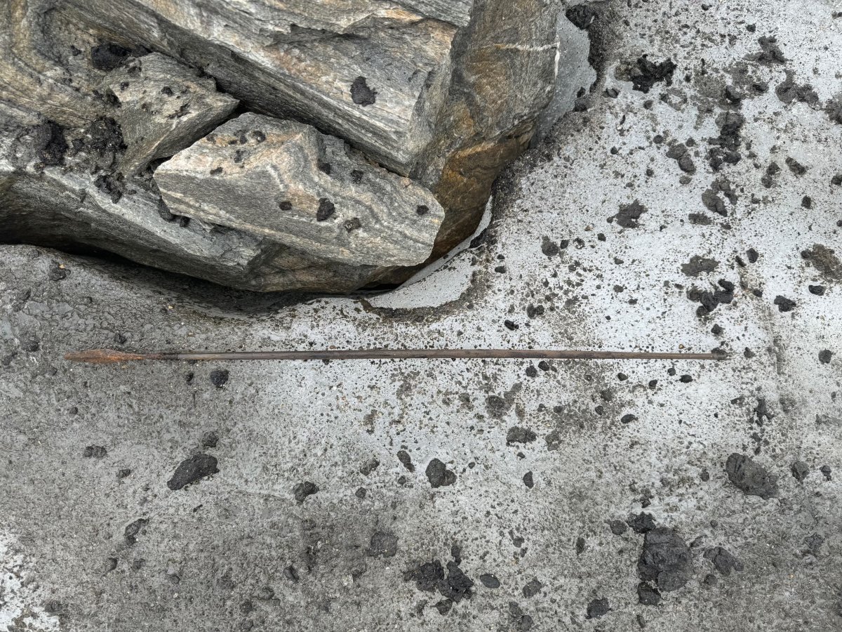 1300-year-old arrow on glacial ice in Norway. 1300-year-old arrow on glacial ice in Norway.