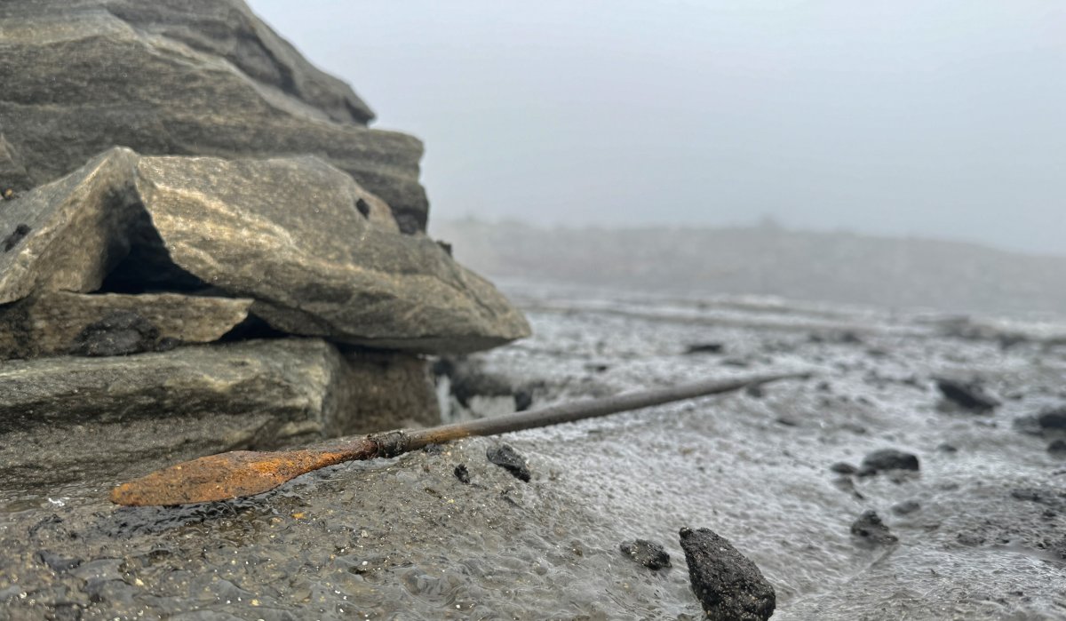 1300-year-old arrow on glacial ice in Norway. 1300-year-old arrow on glacial ice in Norway.