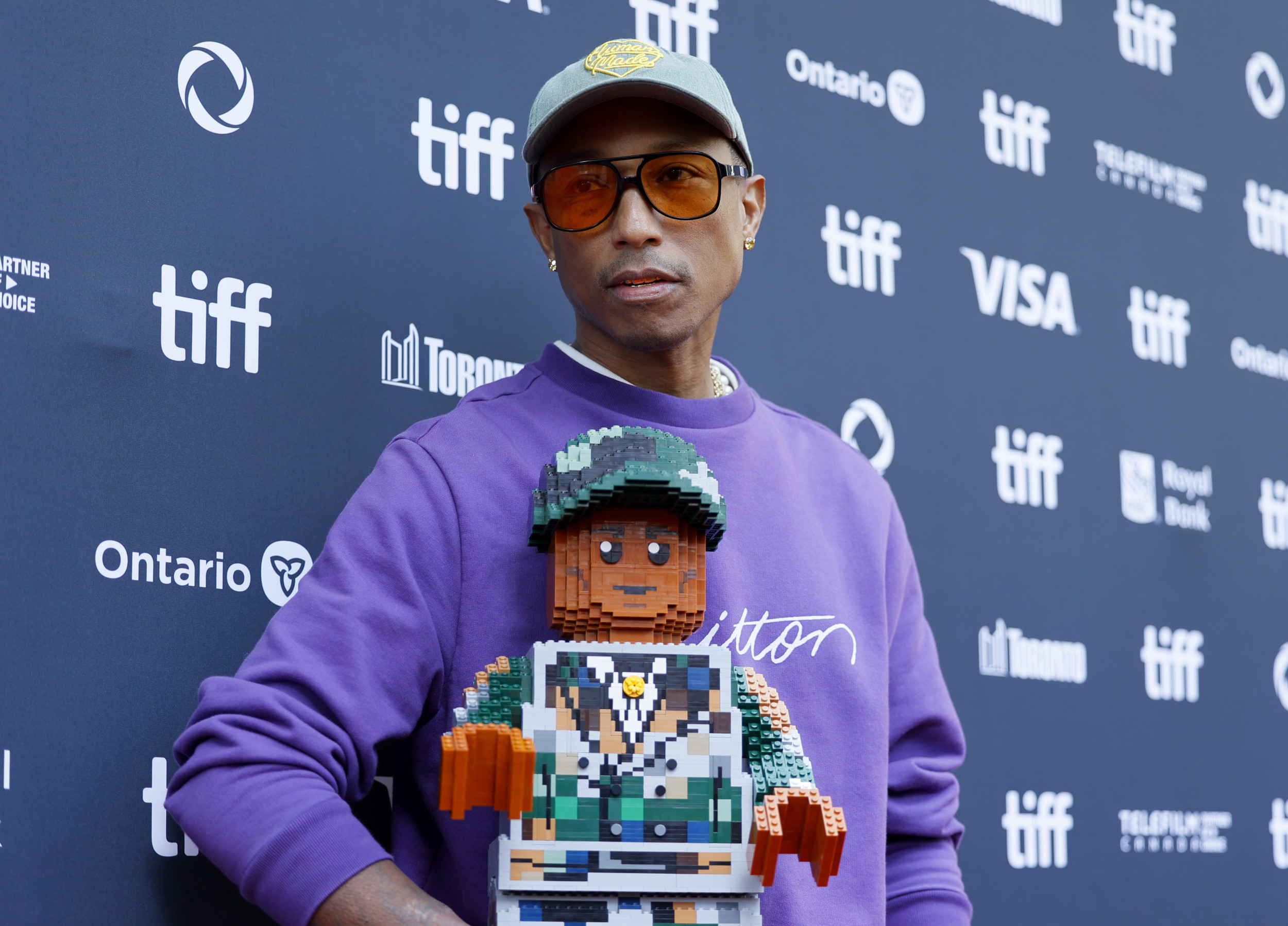 PETA Protests Pharrell Williams at TIFF Premiere