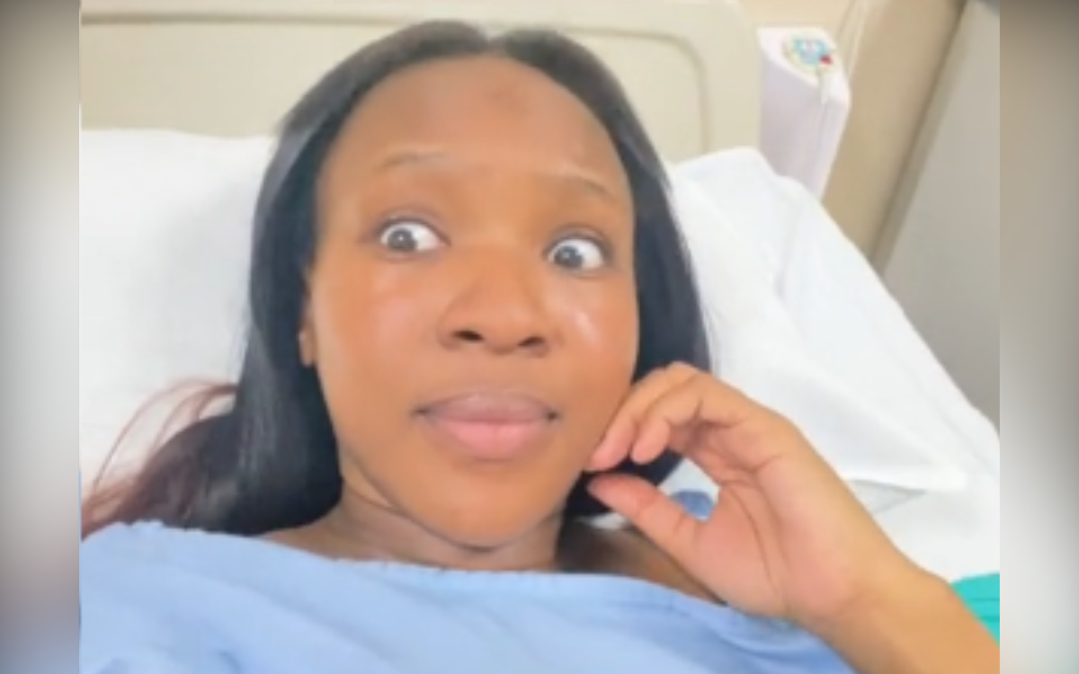 A woman reacts to childbirth sounds