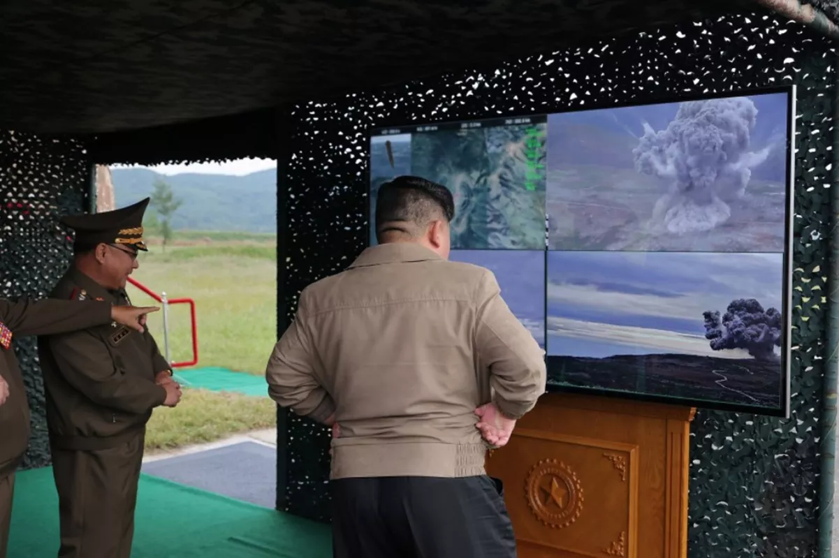 https://d.newsweek.com/en/full/2475148/kim-observes-missile-launch.webp