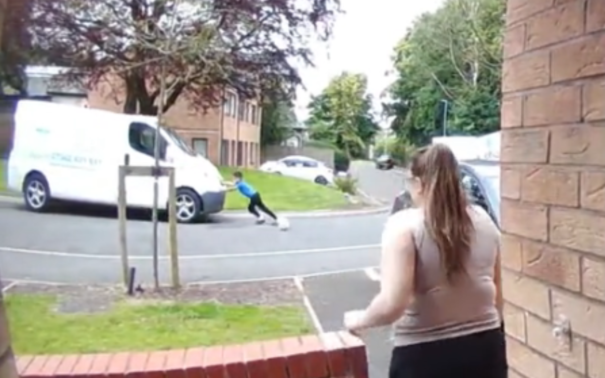 Doorbell cam captures 9-year-old stopping rolling van with his bare hands