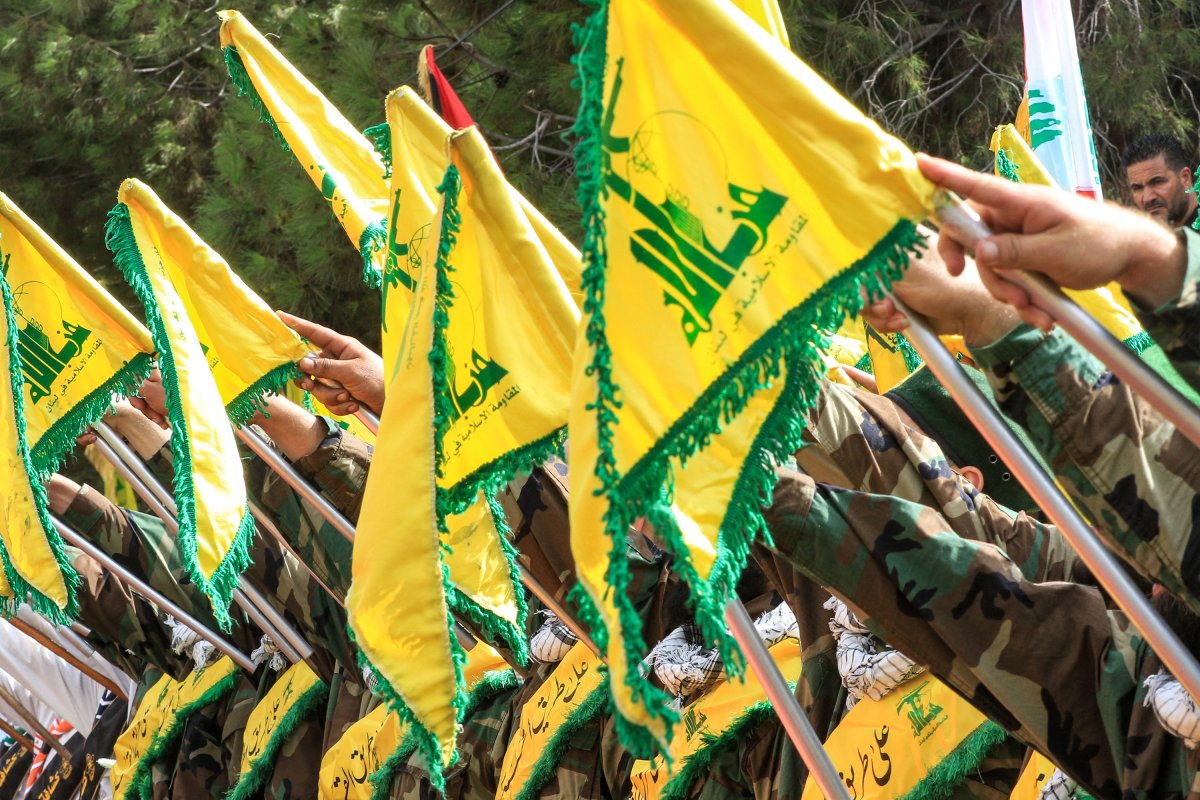 Hezbollah, members, salute, at, funeral