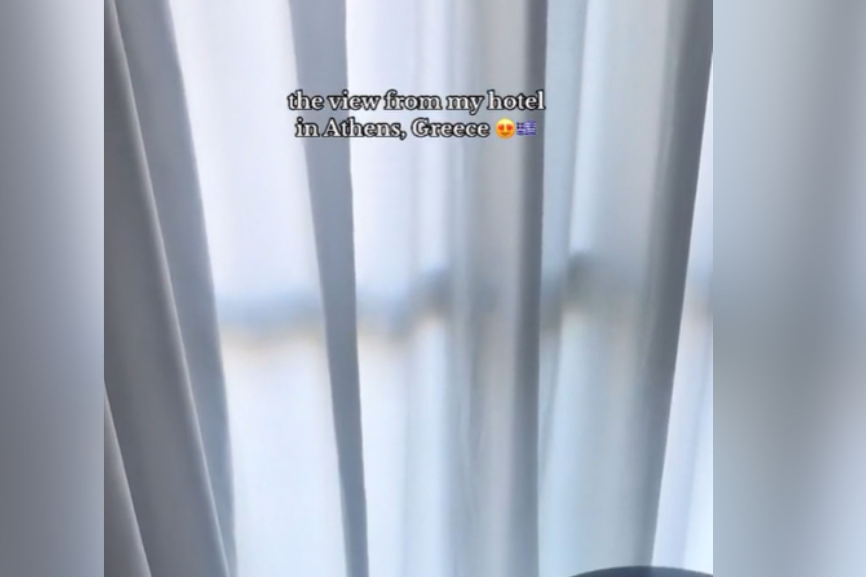Tourist Opens Hotel Curtains on Vacation, Nothing Prepares Her for the View