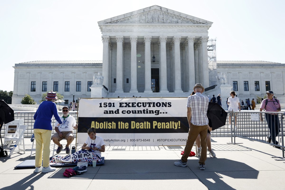 Activists with the Abolitionist Action Committee stand