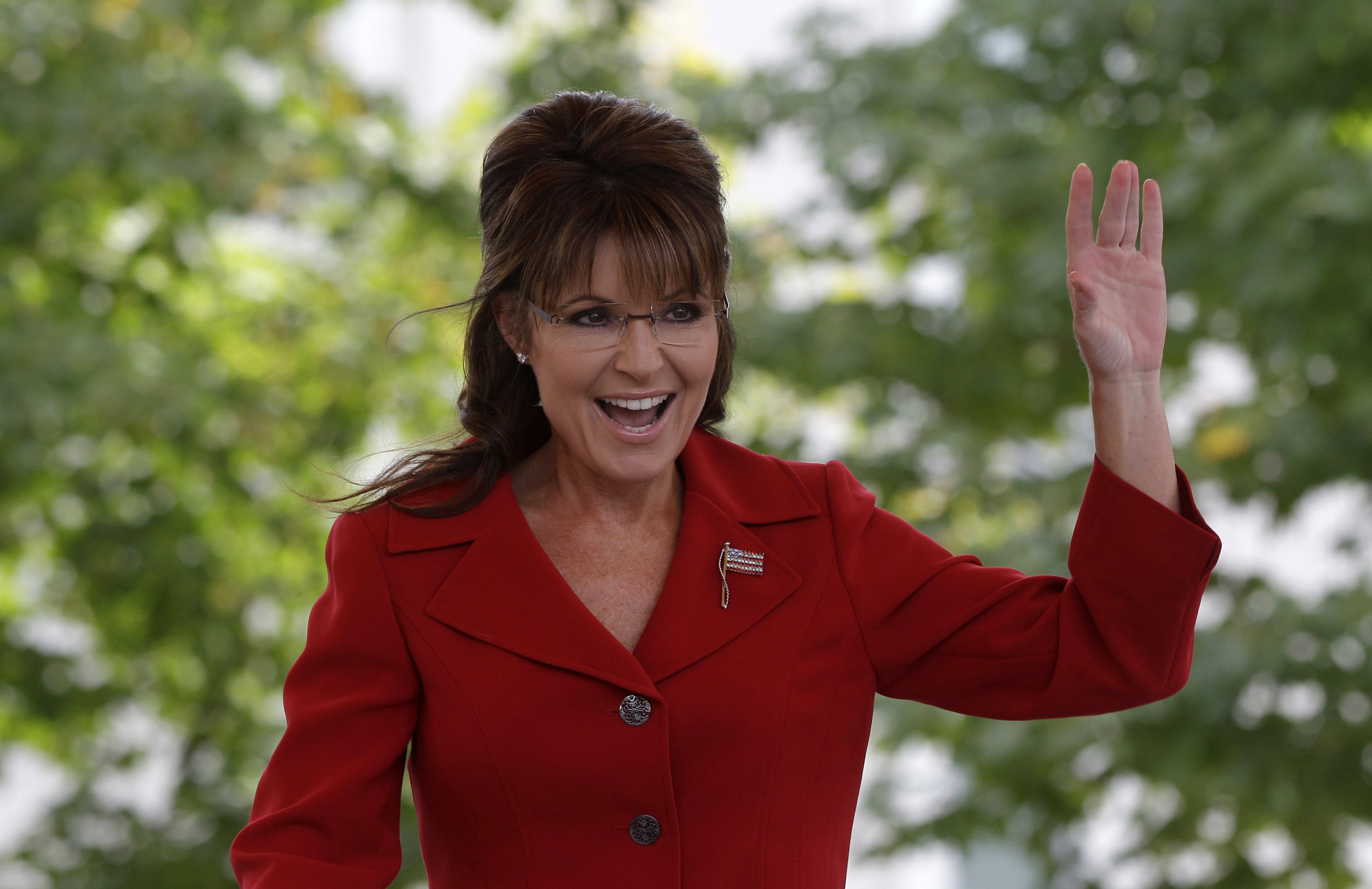 Photo: Former vice presidential candidate and Alaska Gov. Sarah Palin waves to supporters in 2011. (Stephan Savoia/AP Photo)