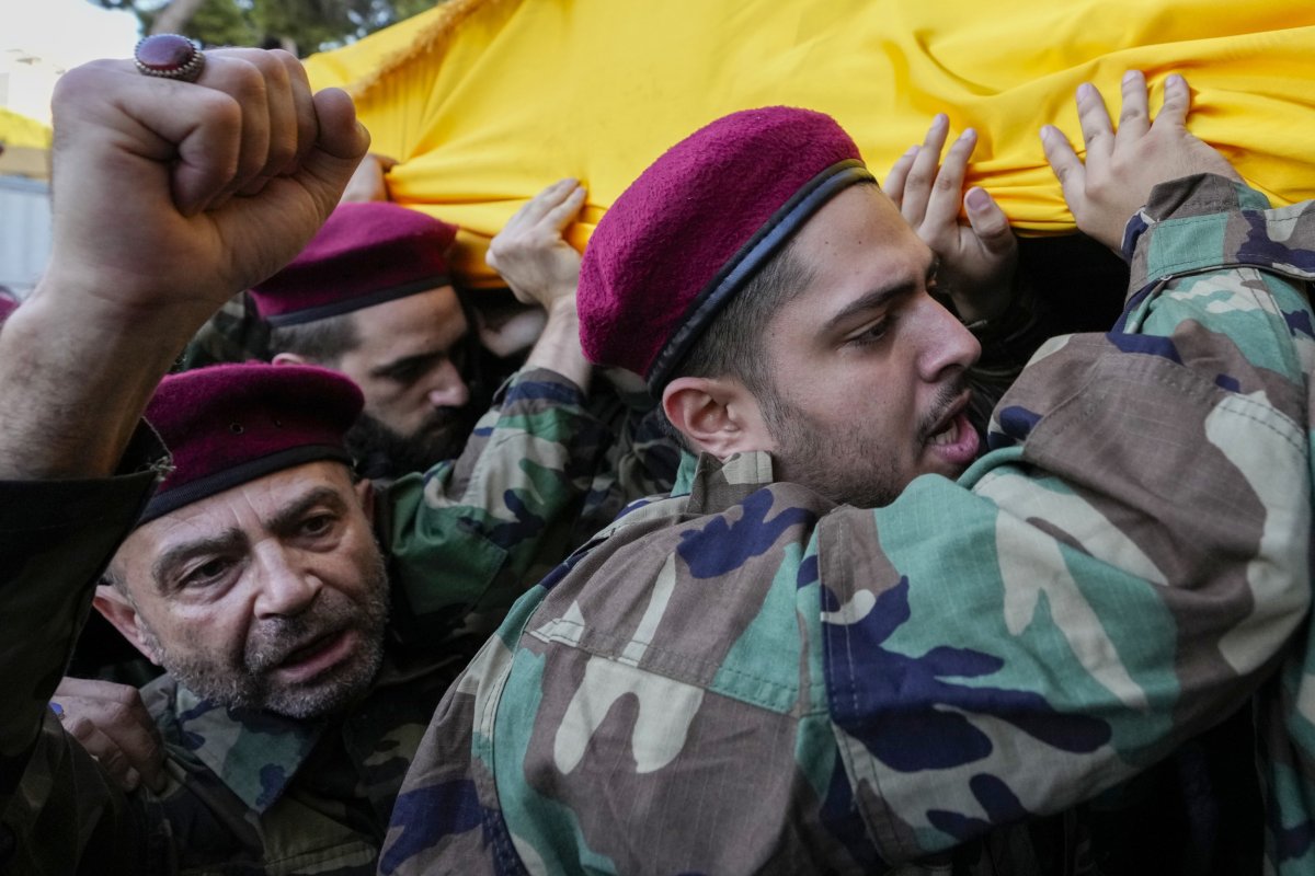 Hezbollah Members Carry Coffins of Leaders