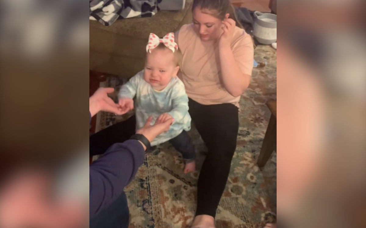 Family focused on baby's first steps doesn't see 3-year-old wielding knife