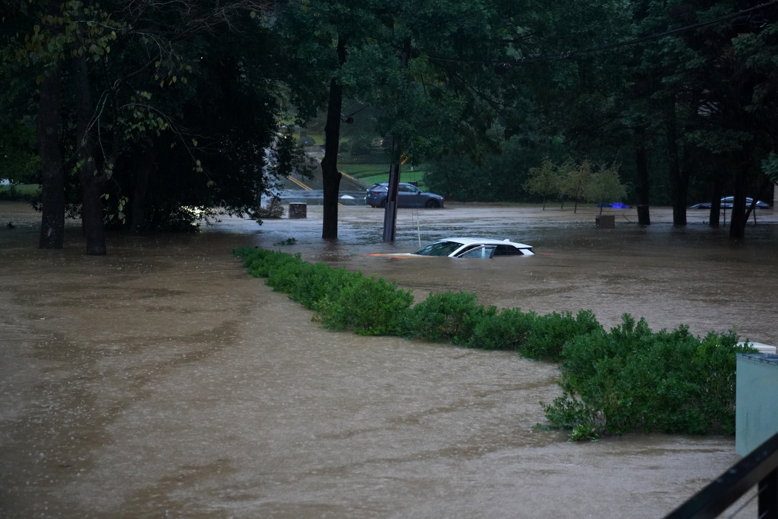 Photo: A car is submerged in the floodwaters in the Buckhead neighborhood in the aftermath of Hurricane Helene on September 27, 2024 in Atlanta, Georgia. (Megan Varner/Getty) 