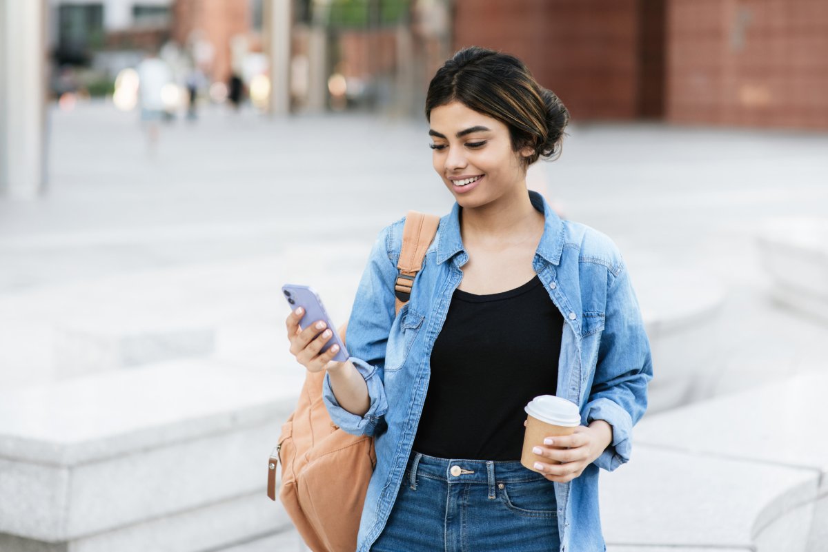 Woman looks at the phone